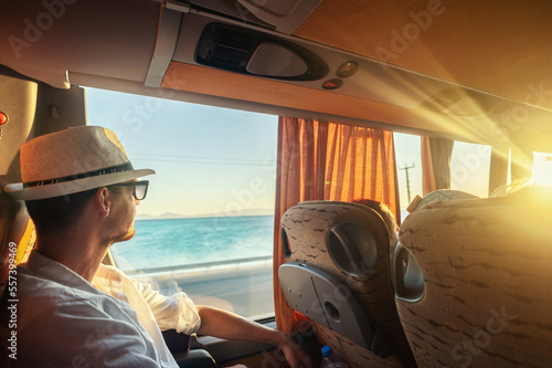 Canvas Print A man traveling with a bus