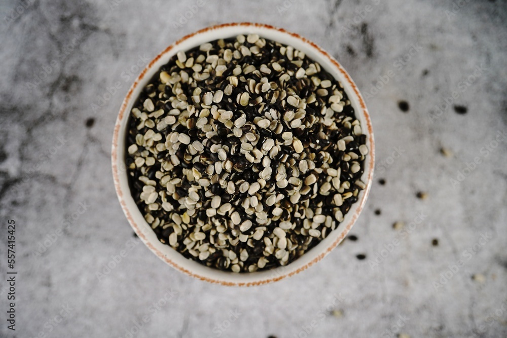 Black Lentils pulses | Urad daal served in a bowl, selective focus Black Lentils pulses | Urad daal served in a bowl, selective focus