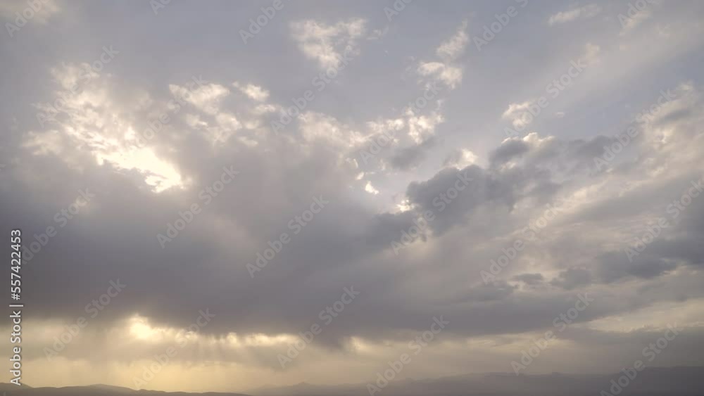 Sunset behind the clouds. Flight of birds Sunset behind the clouds. Flight of birds
