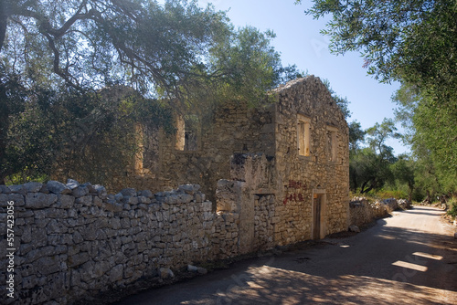 Tableau sur toile A large, imposing, but ruined and roofless farmhouse near Ozias, Paxos, Greece: