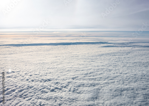 View above the clouds in 10 000 meters in airplane