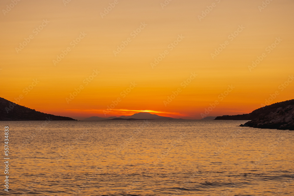 Red sunset over Greek islands in summer