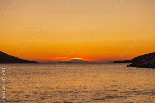 Red sunset over Greek islands in summer