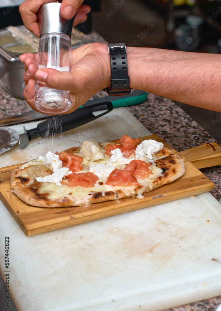 Rectangular shape and thick hand made romana's pizza