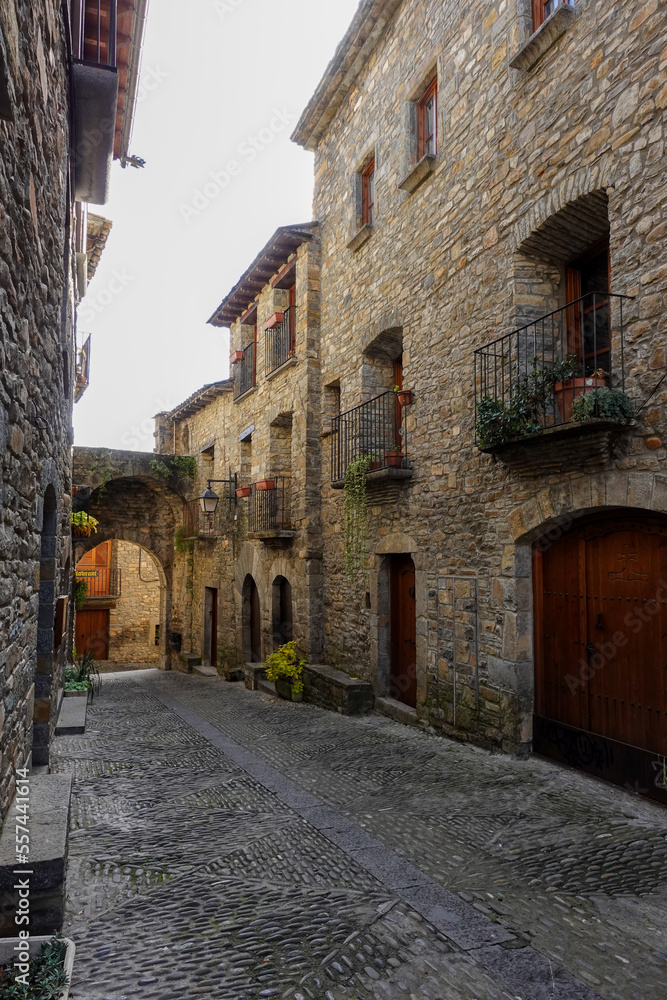 Stone houses of old Spanish village on sunny autumn day