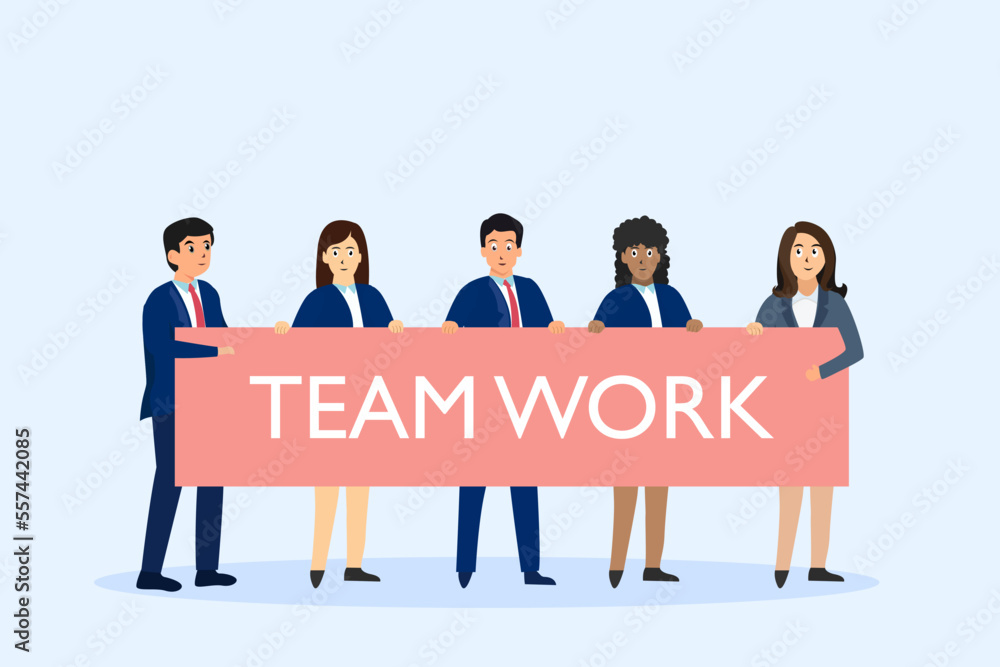 group of business people holding a banner with teamwork text group of business people holding a banner with teamwork text