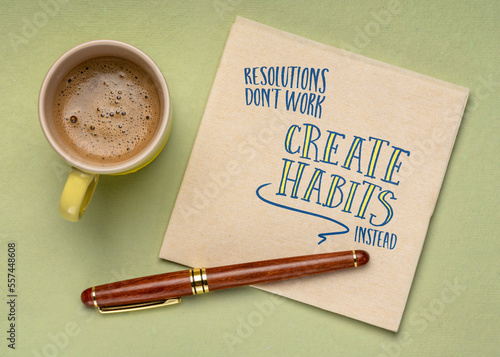 resolutions do not work, create habits instead -  inspirational advice or reminder on a napkin, New Year resolutions, setting goals and personal development concept