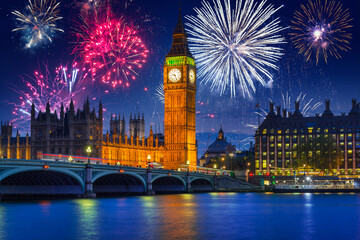 New years fireworks display over the Big Ben and Westminster Bridge in London, UK