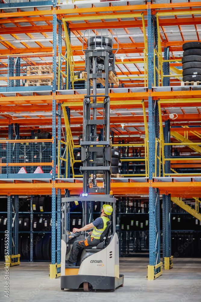 Warehouse worker operating a forklift 