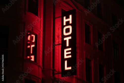 Red neon hotel sign - Tight © Mustard Assets