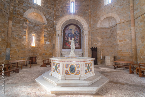 The Baptistery of San Giovanni an octagonal thirteenth-century religious building standing just in front of the Duomo of Volterra photo