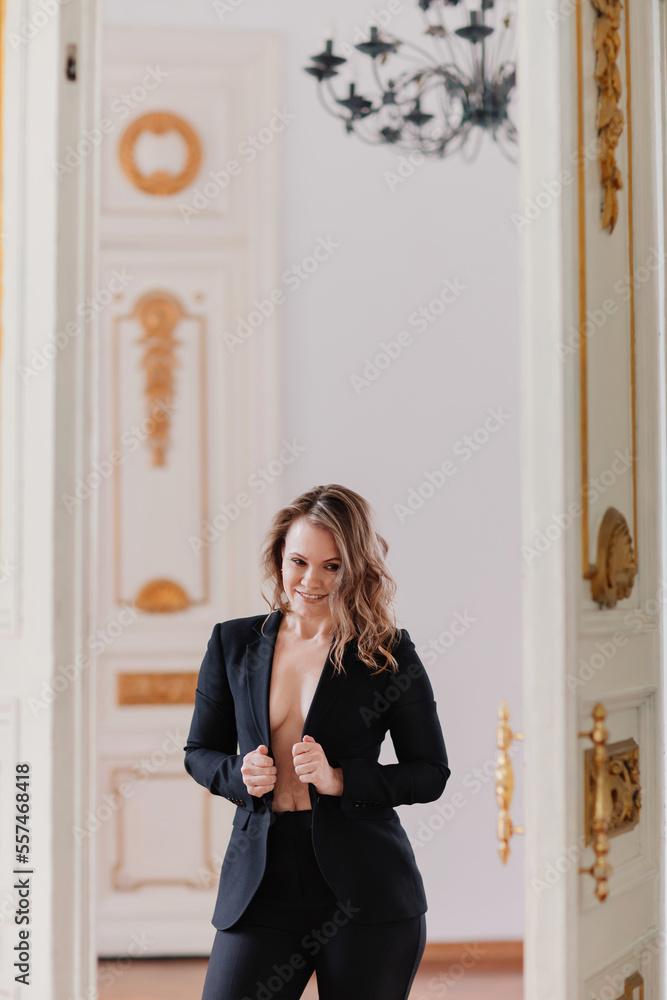 happy woman topless in a black jacket. the concept of women's health and beauty. happy woman topless in a black jacket. the concept of women's health and beauty.
