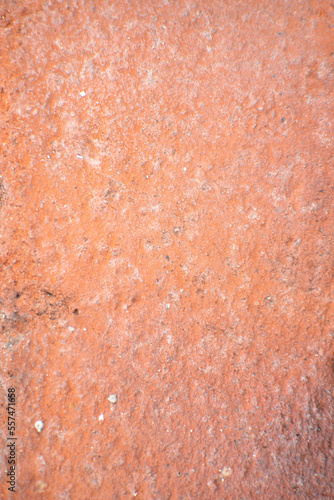 Textura vieja de cemento rojo pared roja de fondo desgastada