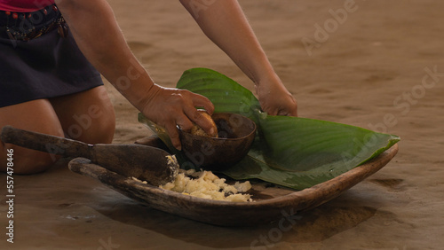 Bilde på lerret Demonstration of how indigenous people make chicha