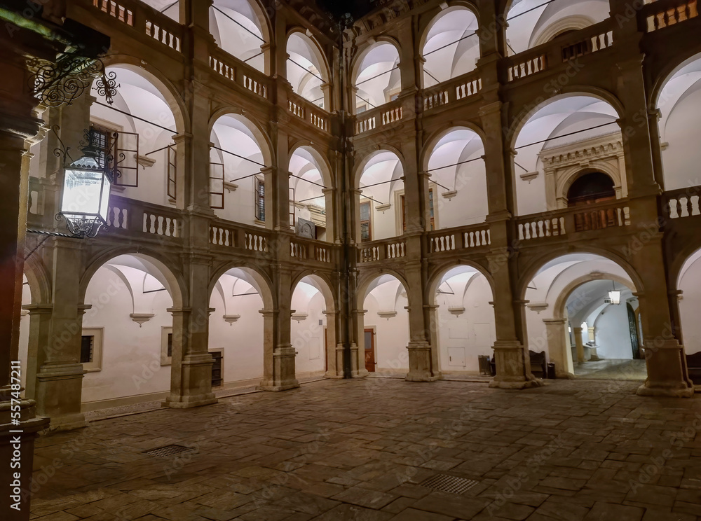 The arcaded inner courtyard of The Styrian Armoury (Landhaus building), a masterpiece of the Italian Renaissance, by night, in Graz, Steiermark, Austria