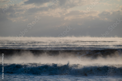 warm ocean water evaporates rapidly in extremely cold weather, producing fog. rare condensation phenomenon 