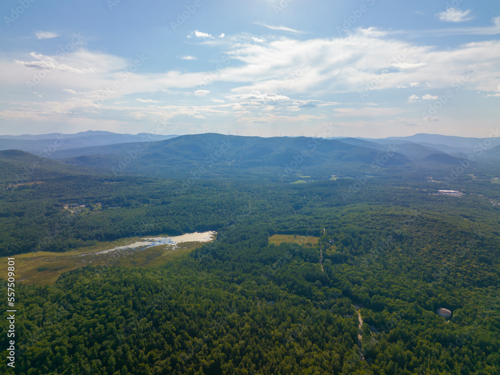 Tenney Mountain aerial view in summer with Groton Wind Power field at the background in Plymouth, New Hampshire NH, USA. 