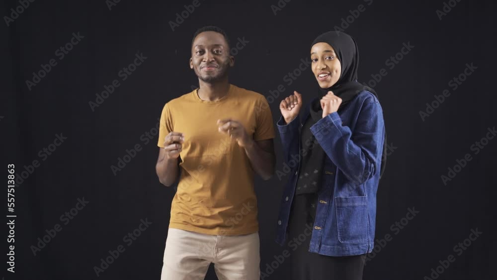 African young man and woman dancing.
Cute and happy African teenagers dancing, having fun and smiling.
African young man and woman dancing.
Cute and happy African teenagers dancing, having fun and smiling.