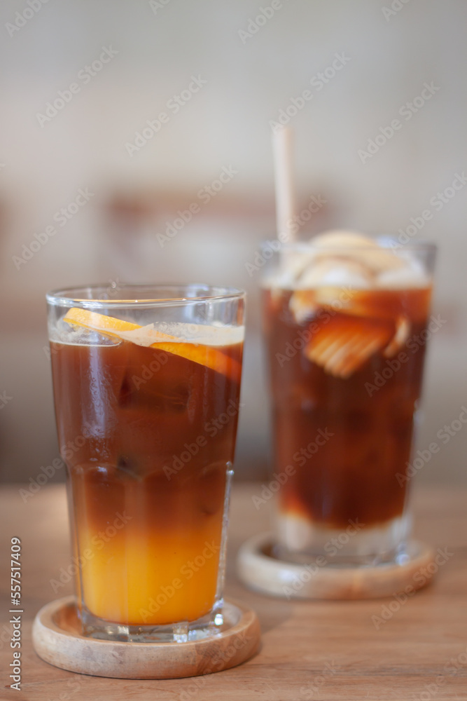 Glass of americano mixed with orange juice Glass of americano mixed with orange juice