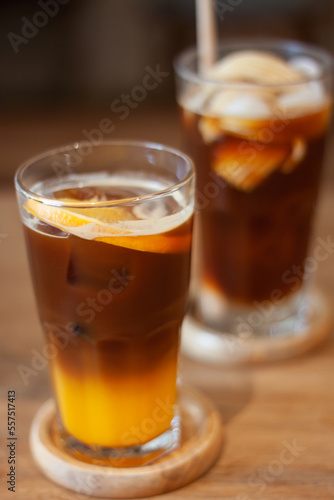 Glass of americano mixed with orange juice © punsayaporn