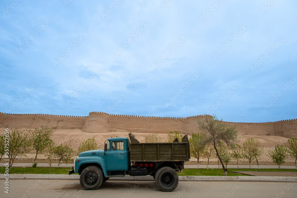 a truck oytside the old city walls of khiva, uzbekistan