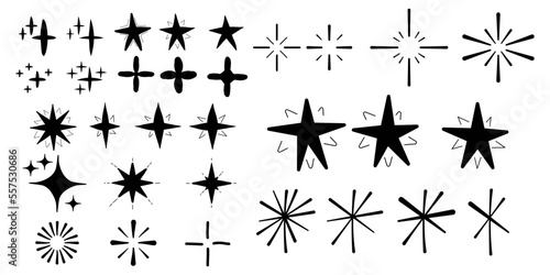 Hand drawn black stars in doodle style. Star shapes line doodle set. Star frame, shiny glitter, shining light vector isolated set.