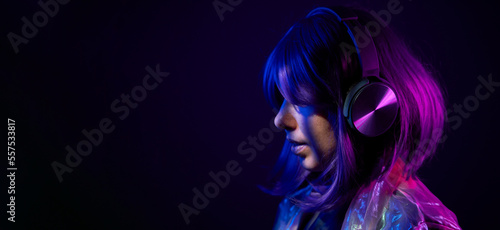 Woman in headphones listening music and enjoing © nuclear_lily
