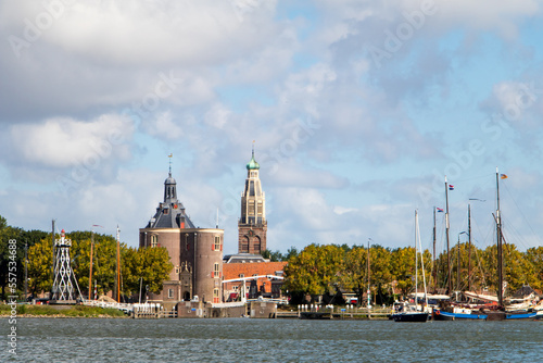 The Dutch city of Enkhuizen seen from the water under summer clouds photo
