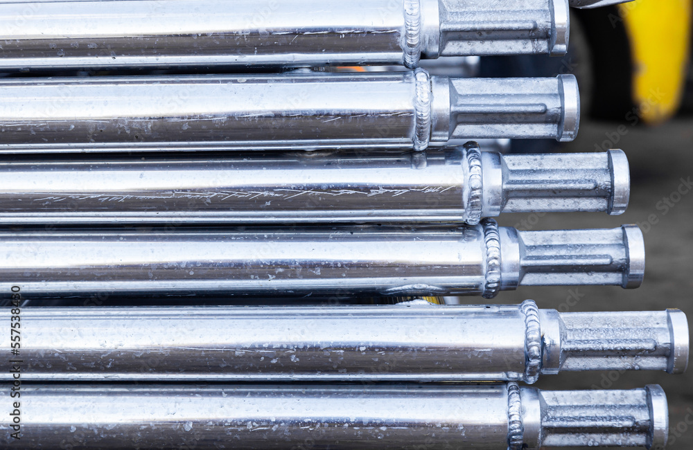 Welded new aluminum pipes close-up. Welded new aluminum pipes close-up.