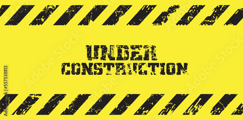 under construction text and brick background © selim