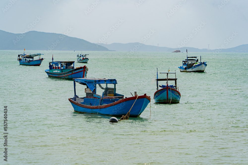 Fishing boats in the sea. The resort town of Nha Trang. The northern part of the city. December. Vietnam. 