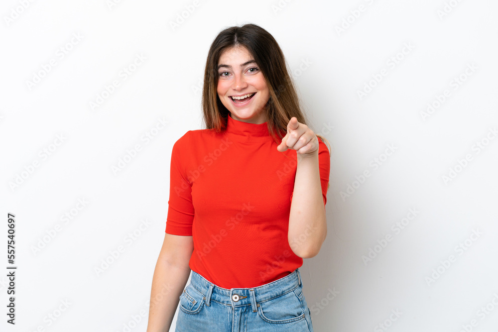 Young caucasian woman isolated on white background surprised and pointing front Young caucasian woman isolated on white background surprised and pointing front