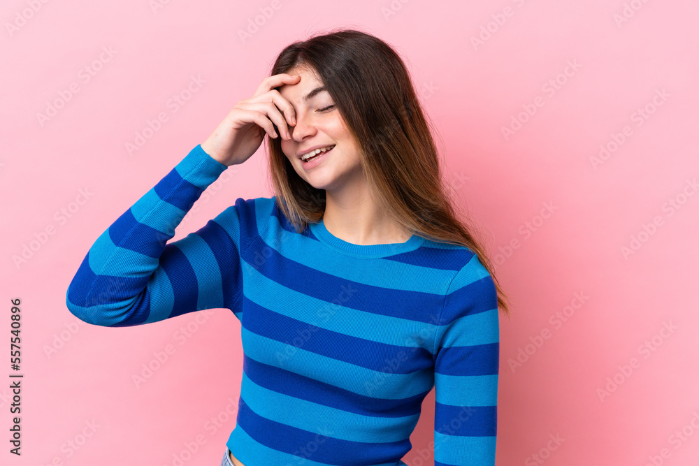 Young caucasian woman isolated on pink background laughing Young caucasian woman isolated on pink background laughing
