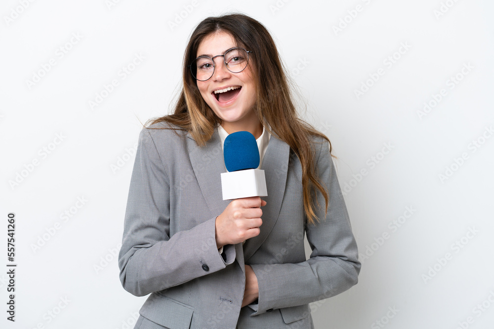 Young caucasian TV presenter woman isolated on white background smiling a lot Young caucasian TV presenter woman isolated on white background smiling a lot