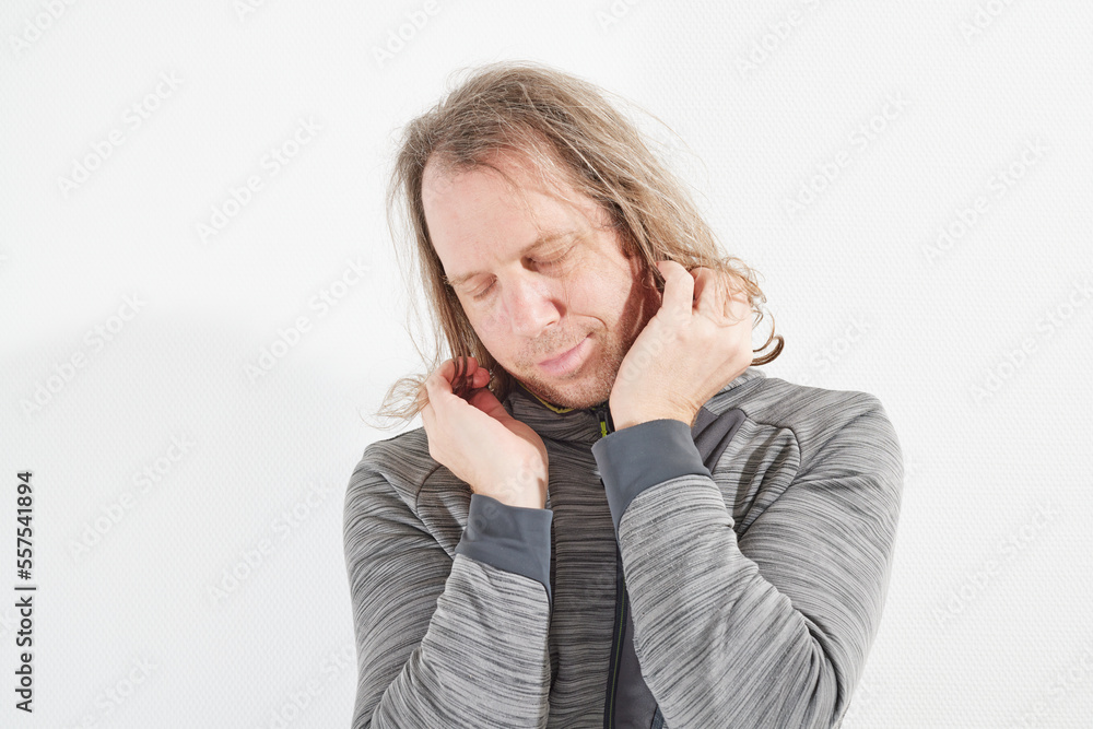 Man happy about his long hair Man happy about his long hair