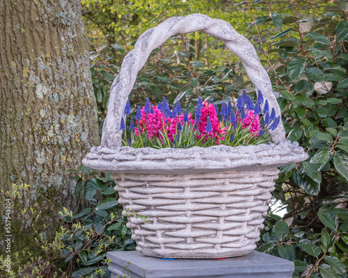 close up of a big basket with mixed flowers