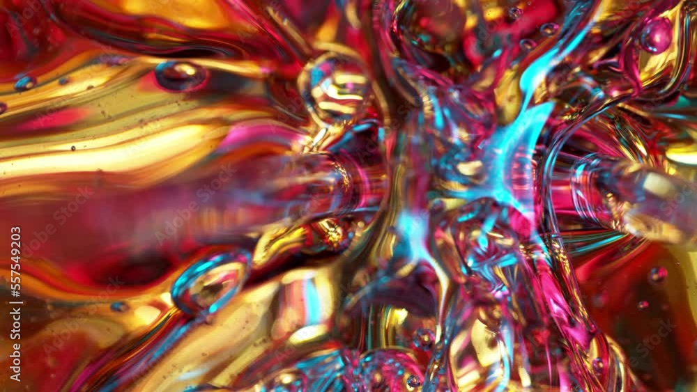 Super Slow Motion Shot of Splashing Abstract Color Liquid Background. Close-up, 1000 fps. Super Slow Motion Shot of Splashing Abstract Color Liquid Background. Close-up, 1000 fps.