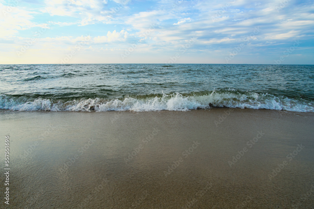 Beach Baltic Sea coast with quartz sand and rolling waves. Beach Baltic Sea coast with quartz sand and rolling waves.
