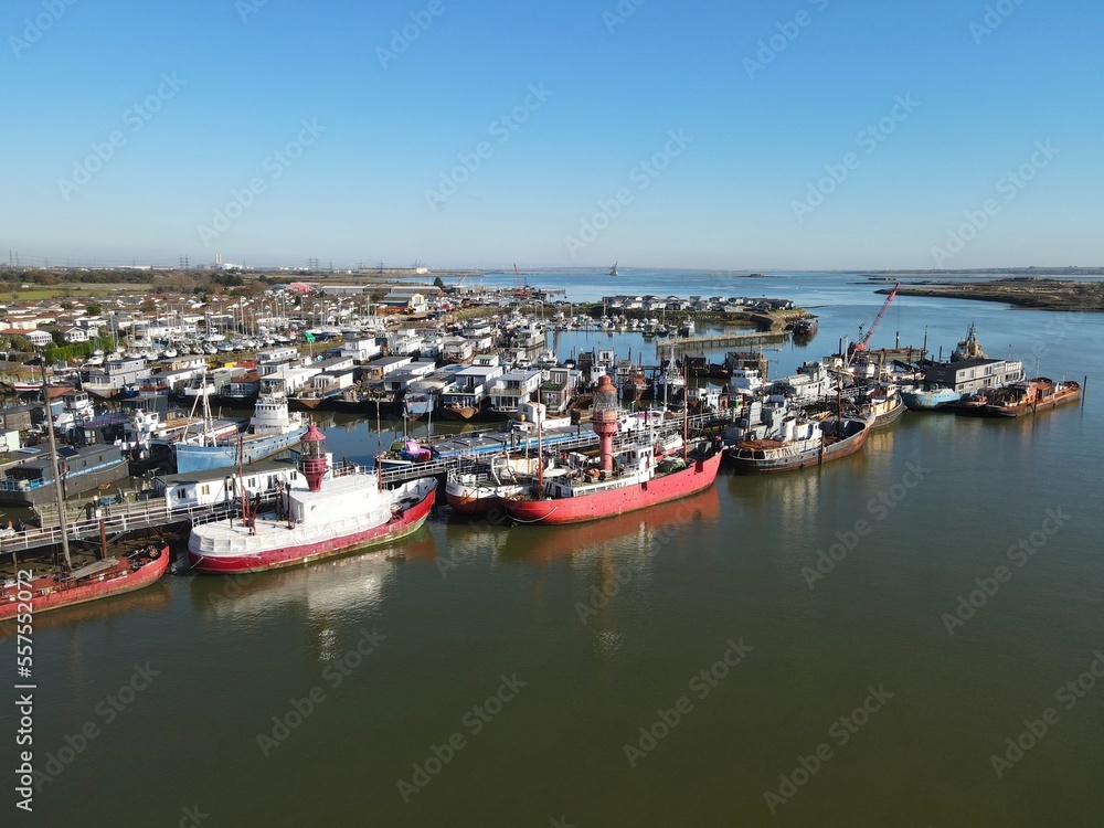 Disused Lighthouse ships moored river Medway Kent UK drone aerial view
