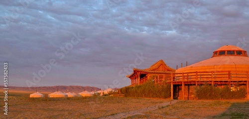 Sunrise on Mongolian traditional gers lodge in Gobi Desert, Mongolia  photo