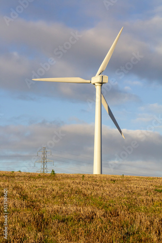 A modern zero emmissions wind turbine located on the road from Newtownards to Dundonald in Northern Ireland photo