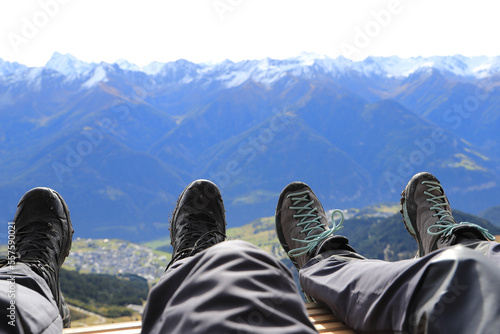 two hikers are resting in the mountains © maho