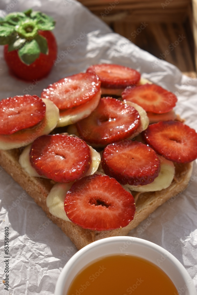 Close up strawberry and banana toast Close up strawberry and banana toast