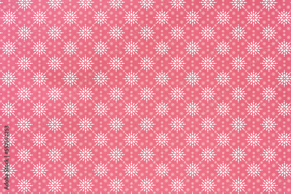 holiday themed scrapbook paper background: white snowflake pattern on red holiday themed scrapbook paper background: white snowflake pattern on red