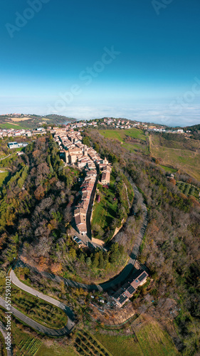 Italy, December 2022: aerial view of the beautiful medieval village of Mondaino in the province of Rimini in the Emilia Romagna region bordering the Marche region photo