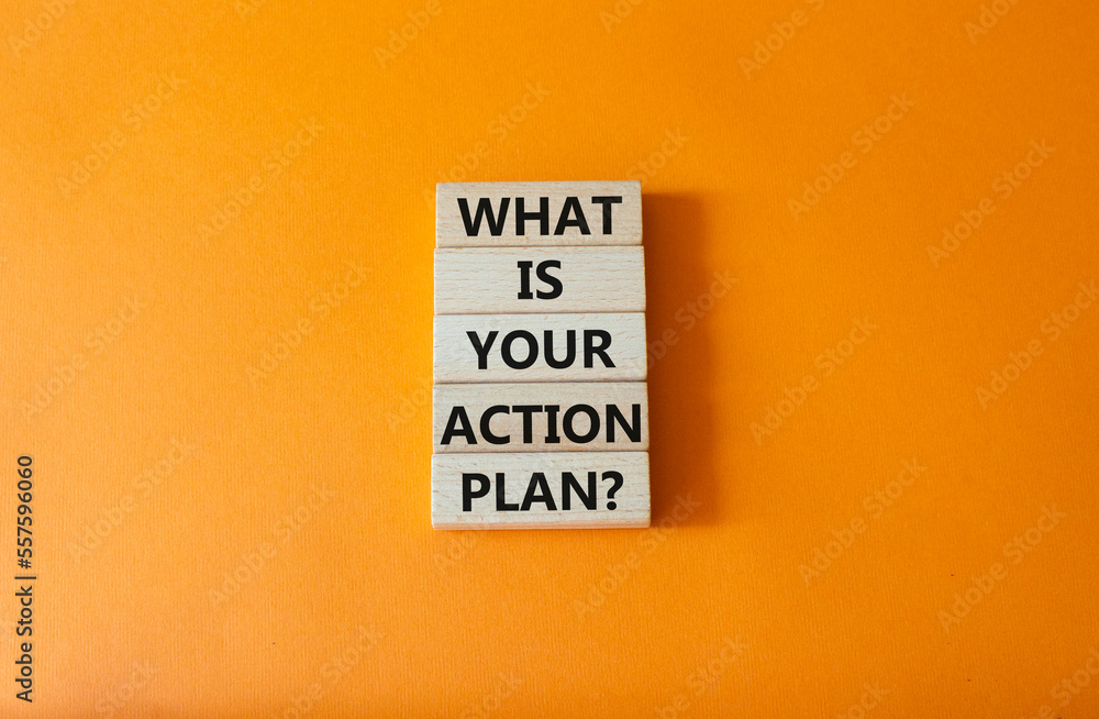 Naklejka premium What is your action plan symbol. Wooden blocks with words What is your action plan. Beautiful orange background. Business and What is your action plan concept. Copy space