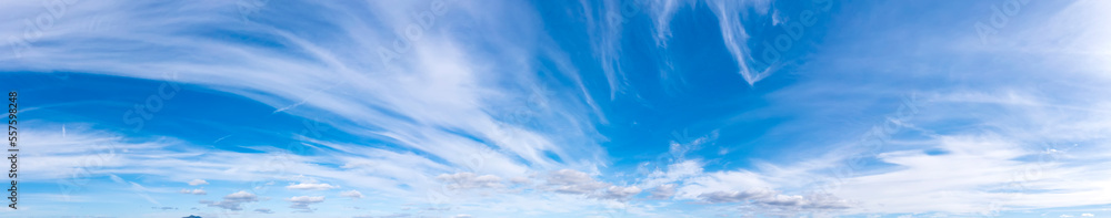 Fototapeta premium Panoramic view of blue sky with fluffy clouds