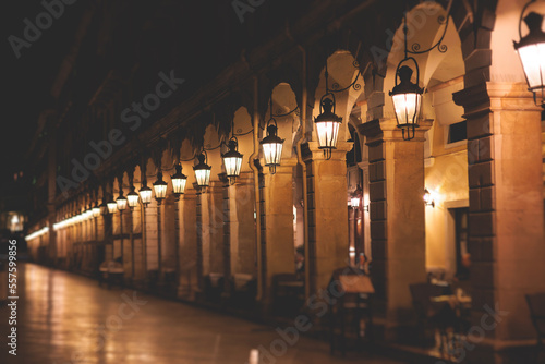 Liston pedestrian street night view with evening lanterns illumination, Kerkyra city, Corfu island, Greece, Ionian sea islands, old town center