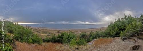 Panorama over the beach in Stillingen bay in Denmark during the day photo