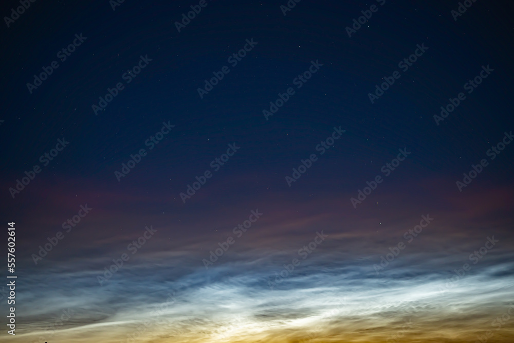 Fototapeta premium Silver clouds in the night sky in Russia.